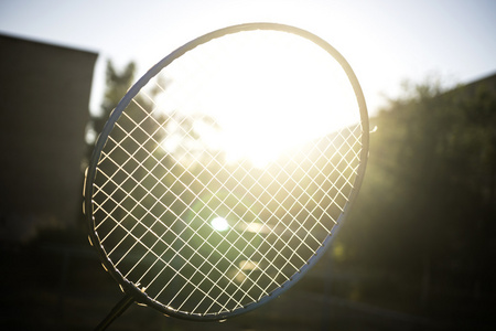 光绽放网球羽毛球拍的太阳强光的照射下绽放筛选的背景照片