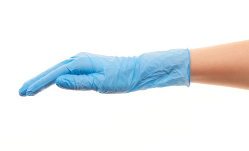 女医生的手在蓝色消毒的外科手术手套