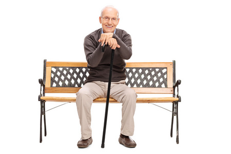 高级绅士坐在板凳上照片