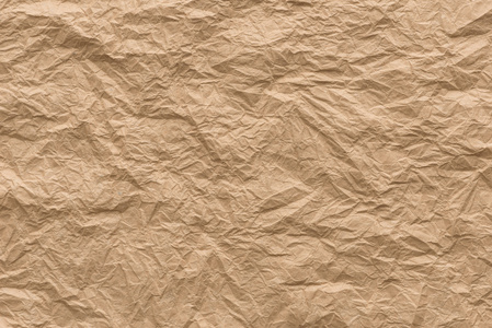背景和纹理的折皱牛皮纸照片