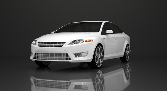 汽车前视图.一辆灰色的背景上的白色轿车的形象照片