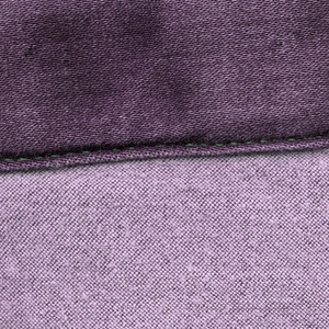 紫罗兰色牛仔布背景装订