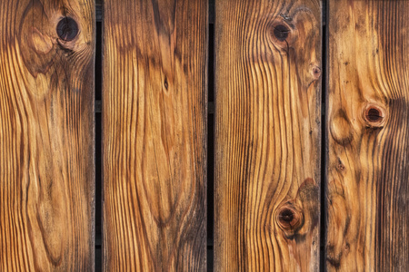 木头疙瘩古老的乡村木栅栏打结木板详细照片