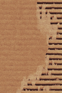 棕色纸板回收瓦楞纸板撕裂的 Grunge 纹理