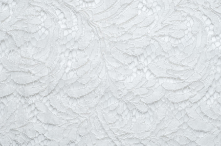 白色背景工作室的花边.由纱线或线制成的薄织物.