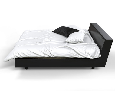 现代床配黑色和白色的枕头