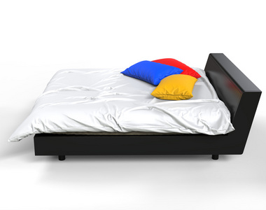现代床与多彩的枕头