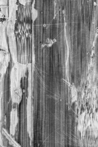 老绝缘漆层压的木板漂白的灰色破解抓去皮的 Grunge 纹理