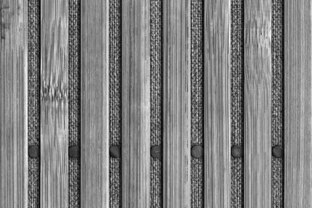 竹餐垫漂白和斑驳的灰色 Grunge 纹理
