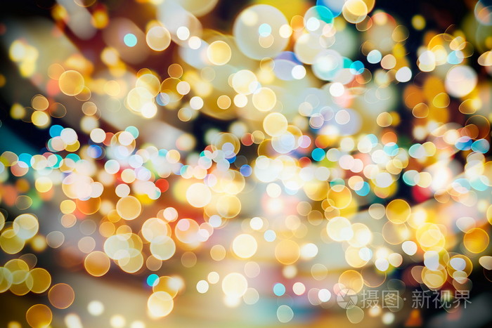 与自然景和明亮的金色灯光的节日背景.老式魔术背景颜色