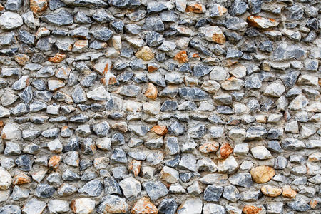 图案灰色现代风格设计装饰不均匀开裂的真石材墙面水泥照片