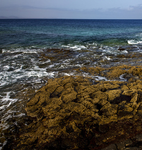 岩石材天空云海滩水西班牙兰萨罗特岛