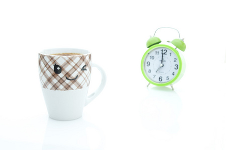 咖啡杯子和时钟