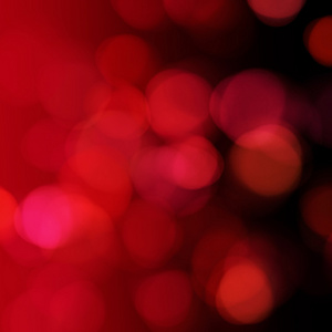 抽象背景上的红色圣诞灯。