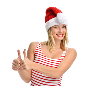 在红色的圣诞老人的帽子笑快乐漂亮的女人的画像
