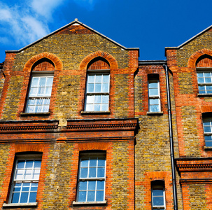 在英国伦敦旧扇窗户砖和玻璃墙图片