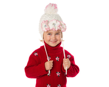 在温暖的帽子和红色的毛衣上 w 的马尾辫的小女孩
