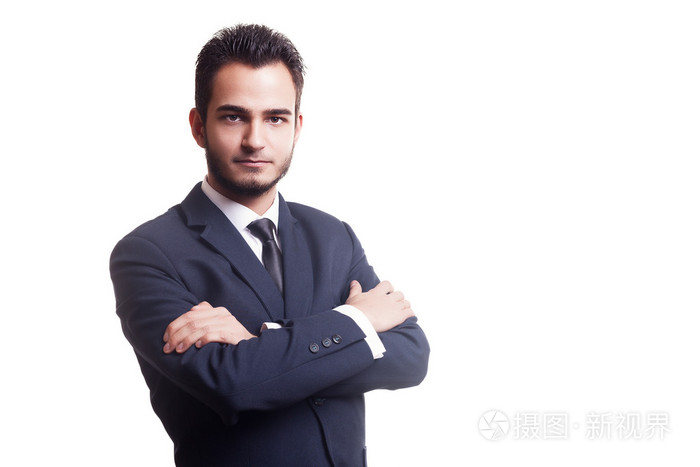 在白色的背景分离的交叉手臂的商人