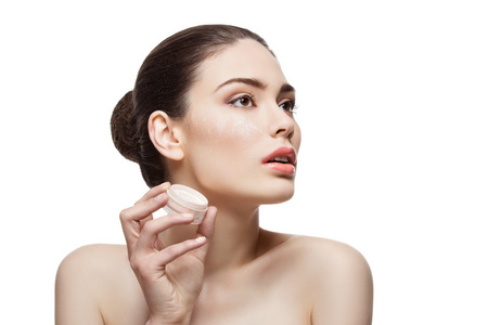 美丽的女孩抱着罐子与散粉照片