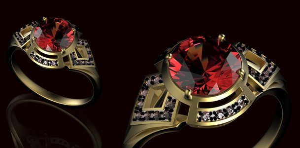 黄金与钻石的订婚戒指。假日的符号。红宝石宝石