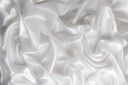 抽象背景豪华布或液体波或波浪褶皱的 grunge 丝绸质地缎天鹅绒材料或