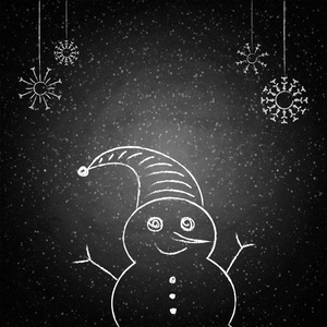 圣诞节绘图雪人站在黑板背景上