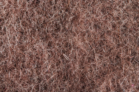 羊毛毡羊毛羊毛毡的纹理特写照片