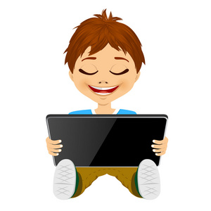 使用平板电脑的男孩图片