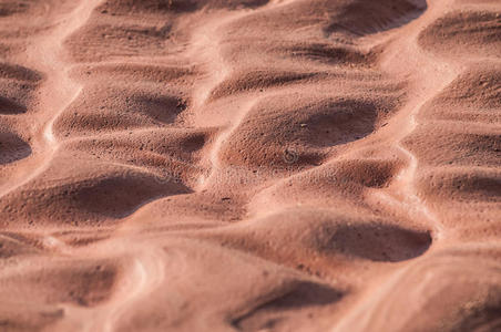 平滑波浪状沙纹理图案背景