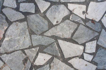 纹理和背景全景石砖纹理的细节白色背景上的石砖样品背景纹理石路面