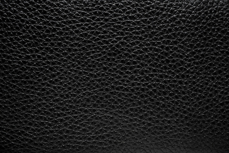 黑色牛皮无缝的黑色皮革纹理,牛皮肤背景的特写照片