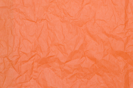 橙色褶皱的纸巾背景