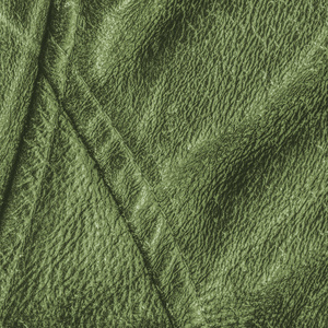 绿色皮革背景装饰带缝