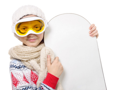 一个快乐的年轻女孩与滑雪板的肖像