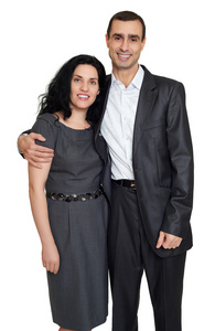 对幸福的夫妇肖像工作室穿着经典的衣服