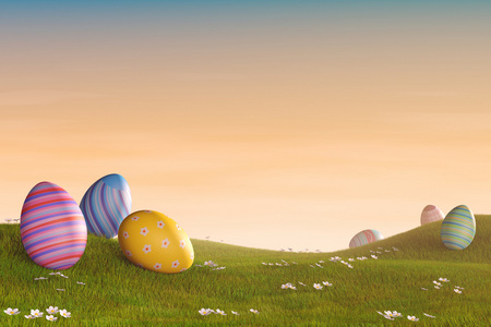 在长满草的丘陵景观在日落时的复活节彩蛋