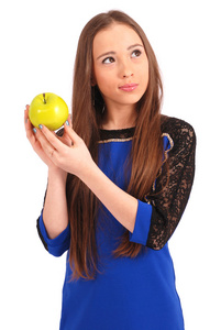 年轻的女孩举行红苹果