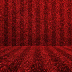 红色的草地足球场为背景