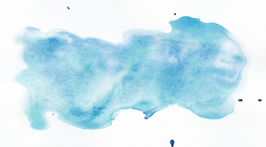 水彩纸上光抽象蓝色油漆的溅