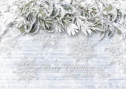 木质背景，圣诞边框和精致的雪花