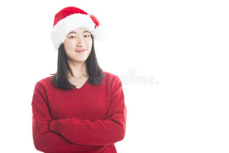 年轻的亚洲妇女，戴着白色隔离的圣诞帽。