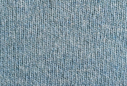 背景为蓝色针织毛织品