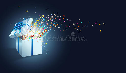 用五彩纸屑放烟花打开礼物.照片