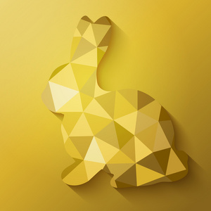 平面设计的金色复活节兔子的多边形