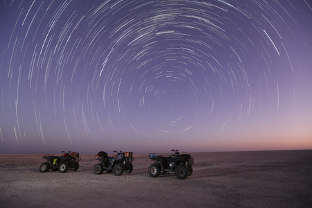 star trail over quad bikes