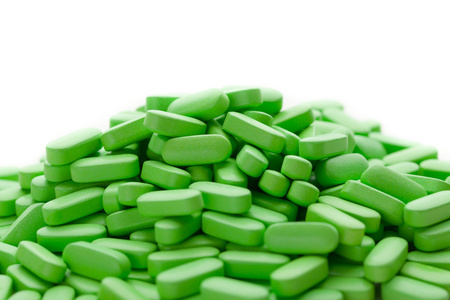 营养补充剂,绿色维生素丸照片