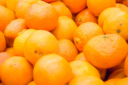 一堆新鲜的橘子和柑图片