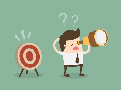 困惑的商人寻找目标照片