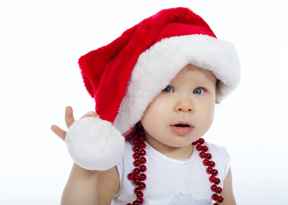 圣诞老人的帽子，白色背景上的小女孩