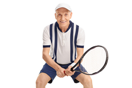 性格开朗的高级人打网球